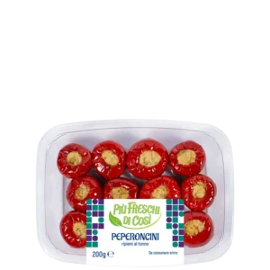 Fresh chili peppers stuffed with tuna in tray